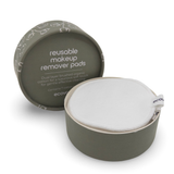 Reusable makeup remover pads in a green container with Ecovask branding on a white background.